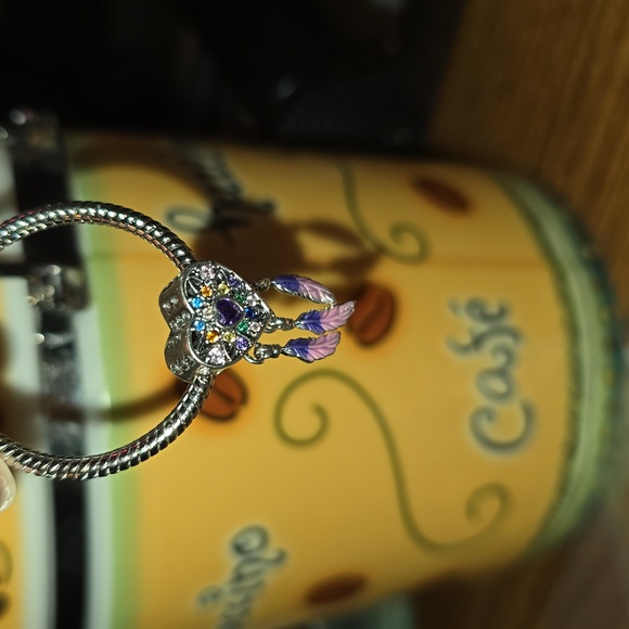 Jewelry - Beautiful heart pendant w/center purple stone & various stones! Feathers danging